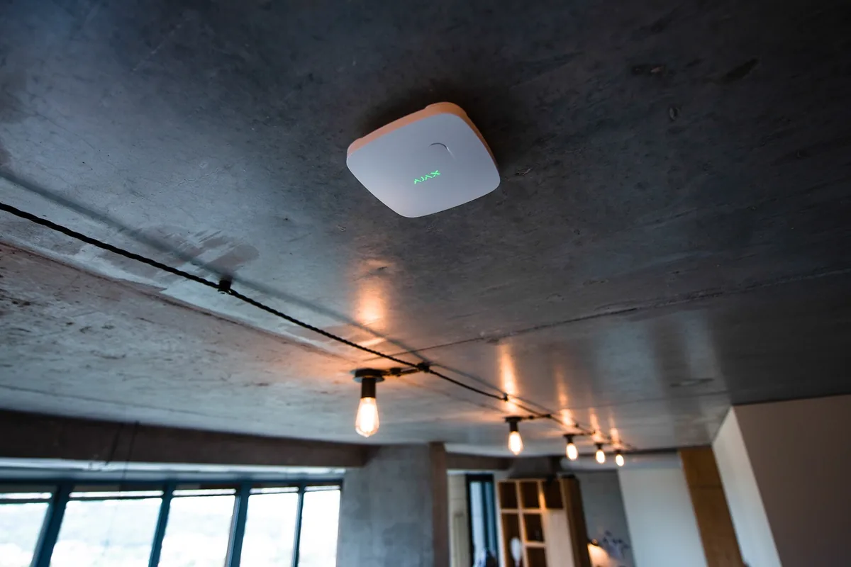 Ceiling-mounted sensor in an apartment room