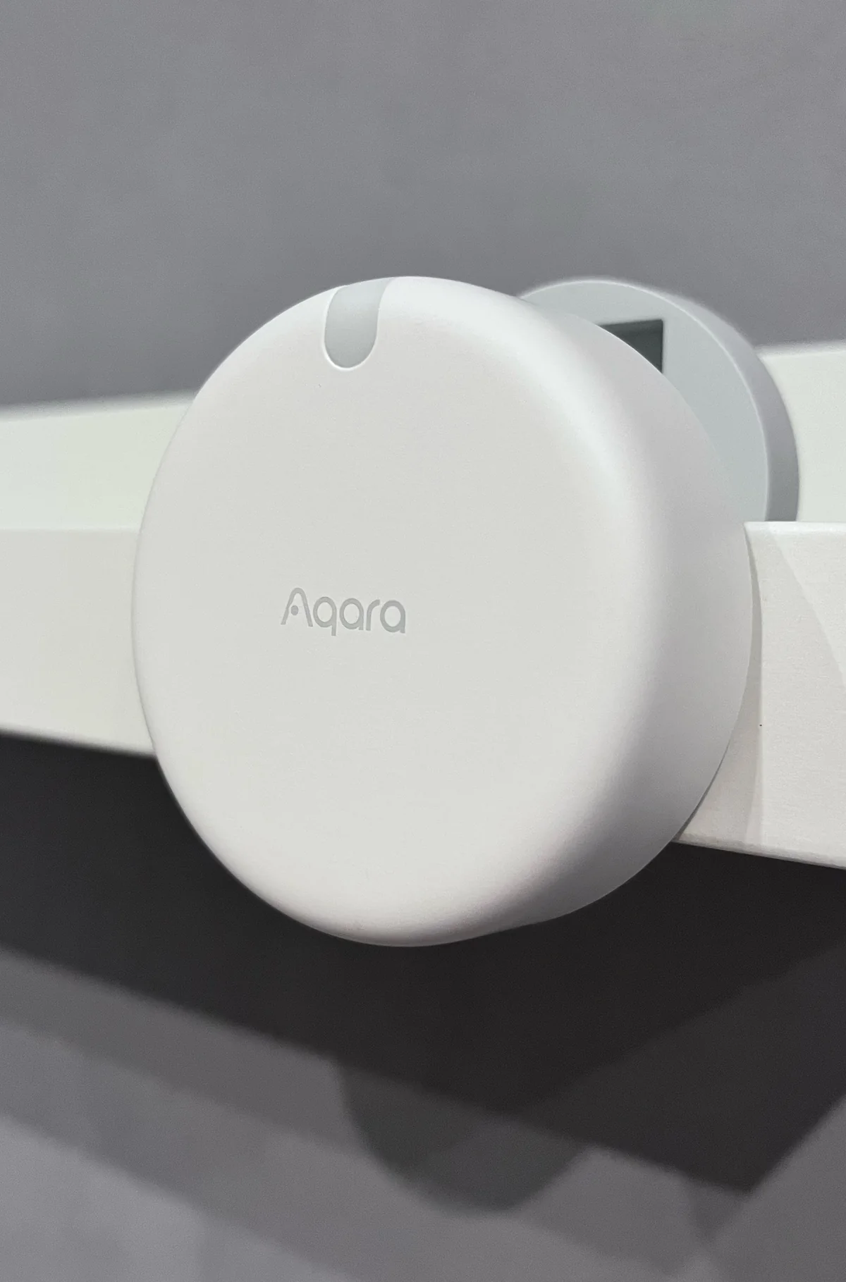 Presence sensor on a room wall